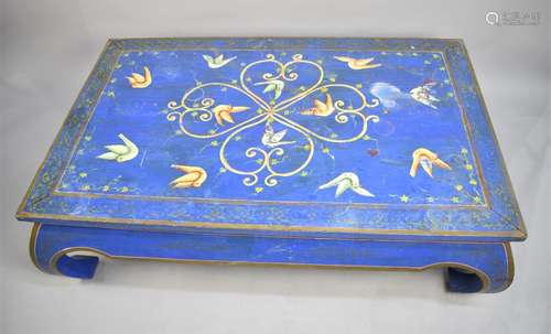 A Painted Coffee Table Decorated with Birds on Blue Ground a...