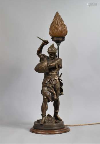 A Large Bronzed Spelter Figural Lamp in the Form of Crusader...