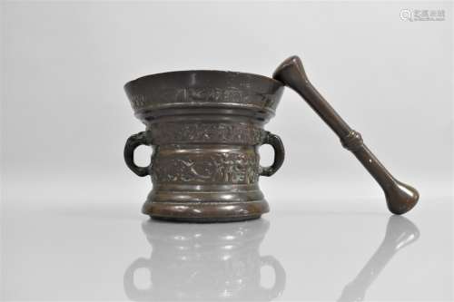 A Heavy Cast Bronze Pestle and Mortar with Band of Foliage a...
