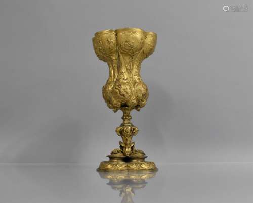 A Gilt Bronze Chalice with Fine Embossed Relief with Cherubs...