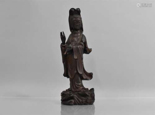 A Late 19th Century Chinese Carved Hardwood Figure of Guanyi...