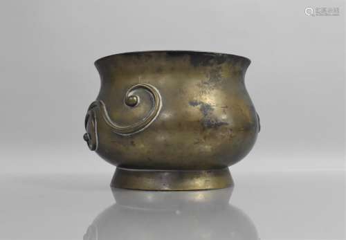 A Chinese Bronze Censer with Applied Decoration, Six Charact...