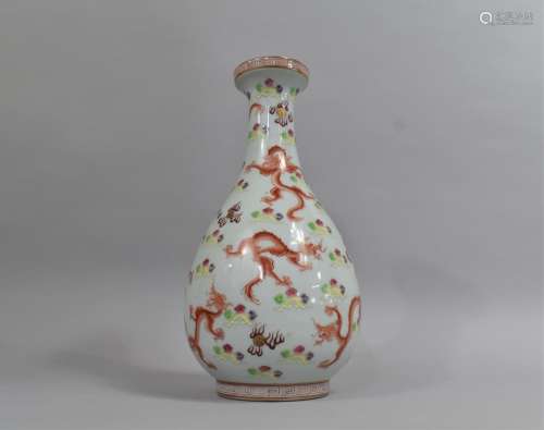 A Chinese Porcelain Vase of Bottle Form decorated with Red D...