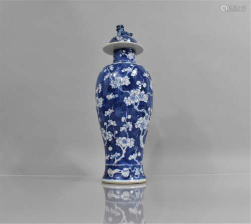 A 19th Century Chinese Blue and White Prunus Pattern Vase an...