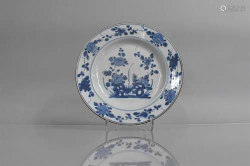 An 18th/19th Century Chinese Blue and White Plate decorated ...