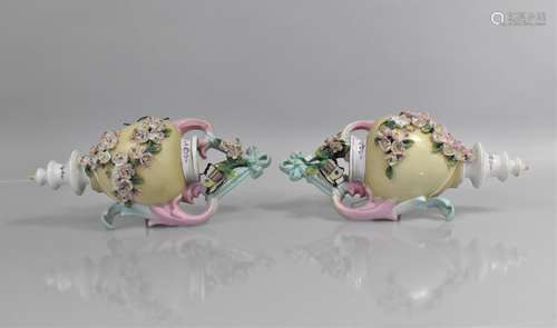 A Pair of Volkstedt Porcelain Wall Pockets in the Form of Cl...