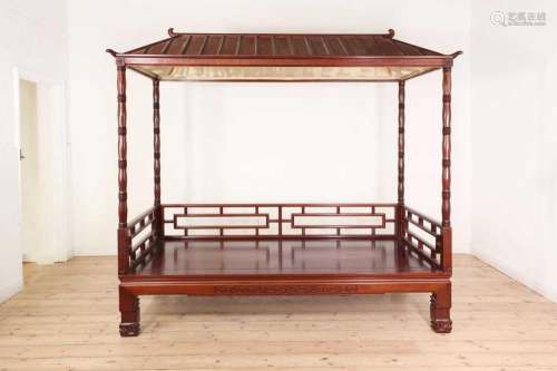 A hardwood daybed in the Chinese Qing dynasty style,