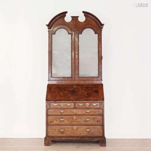 A George I walnut bureau bookcase,