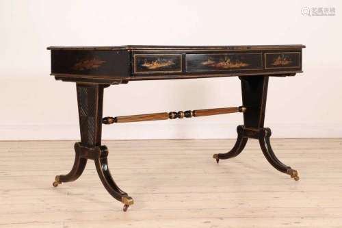A Regency-style ebonised writing table,