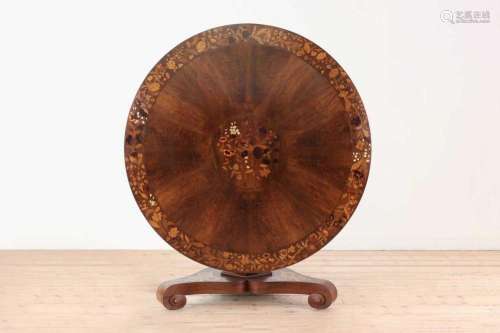 A late William IV marquetry centre table in the manner of Ed...