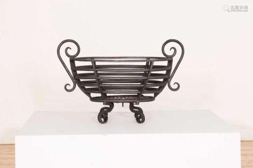 A Regency-style steel fire basket,