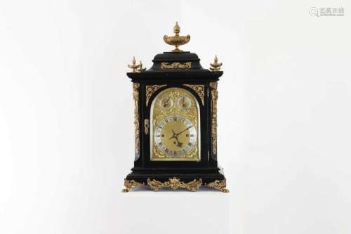 An ebonised musical bracket clock,