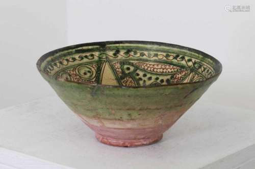A glazed pottery bowl,