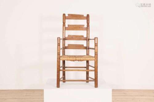 An ash ladder-back elbow chair,