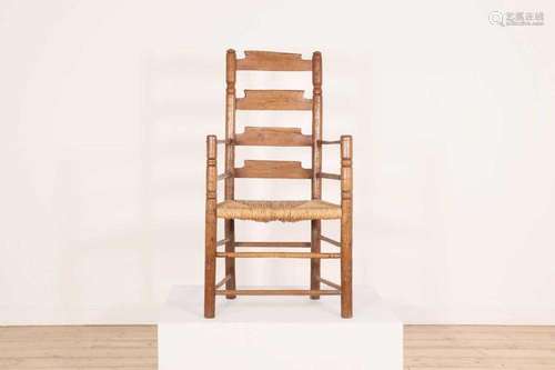 An ash ladder-back elbow chair,