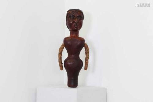 A carved and painted pine bedpost doll,