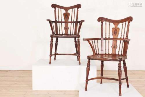 A pair of Victorian mahogany Windsor armchairs, attributed t...
