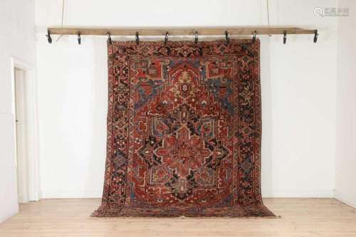 A Persian Heriz wool rug,