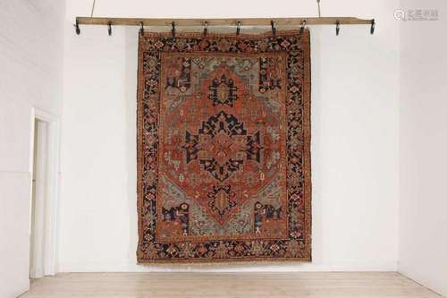 A Persian Heriz wool rug,