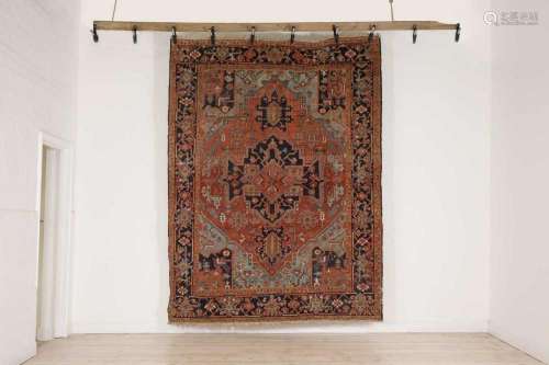 A Persian Heriz wool rug,