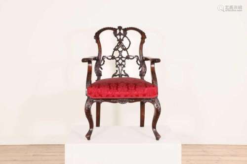 A mahogany ribbon-back elbow chair,