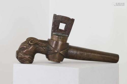 A patinated bronze spout in Gothic style,