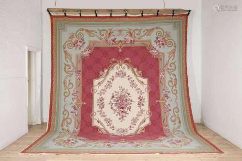A needlepoint carpet of Aubusson design,