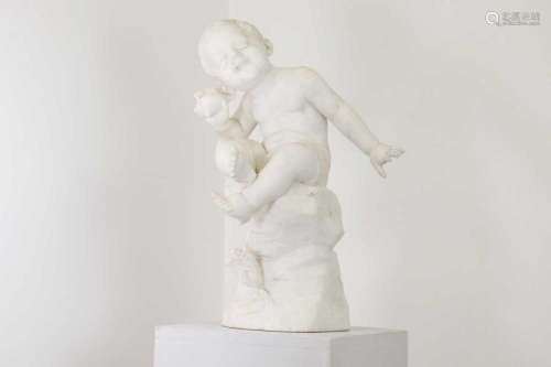A carved marble figure of a young boy,