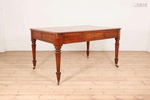 A large golden oak library table,