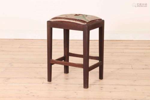 A small George III mahogany footstool,