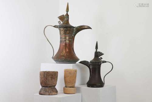 Two Omani copper dallah coffee pots,