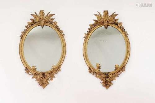 A pair of giltwood wall mirrors,