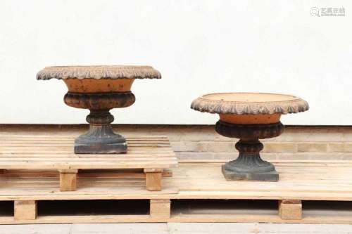 A pair of Victorian terracotta urns,