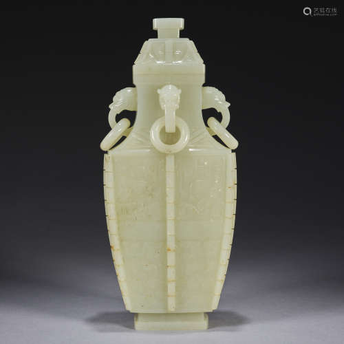 A finely carved jade 'dragon'-handled 'archaistic vase ,Qing...