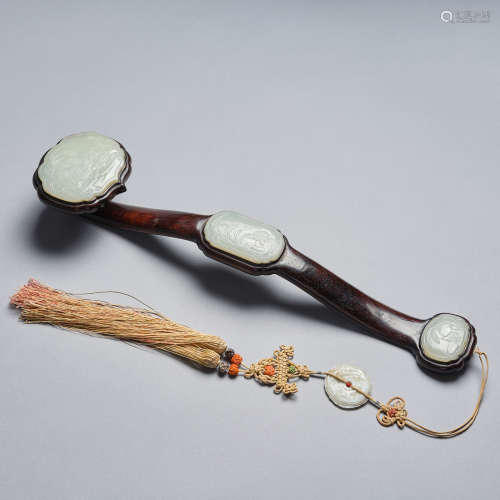 A white jade-inlaid wood ruyi scepter, Qing dynasty