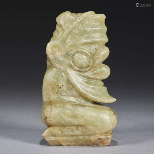 A rare and large celadon and russet jade carving, Neolithic ...