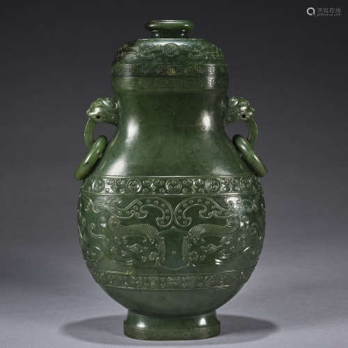 A finely carved spinach-green jade 'Beast' vase ,Qing dynast...