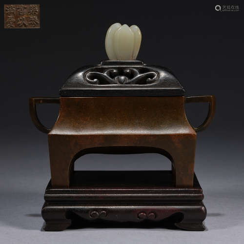 A small bronze incense burner with wood cover and wood stand...