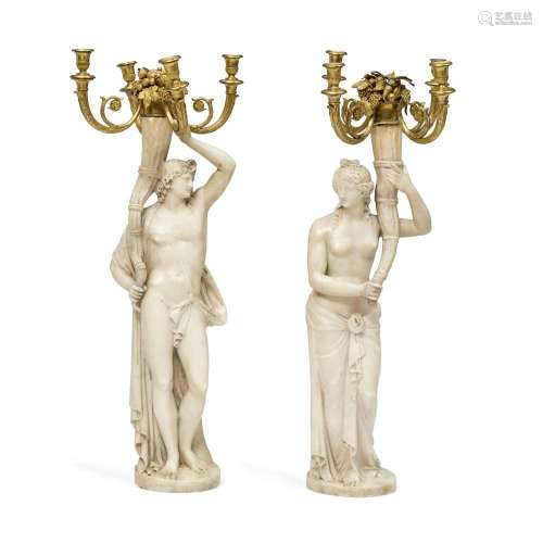 A PAIR OF FRENCH CARVED MARBLE AND GILT BRONZE FIGURAL FOUR-...