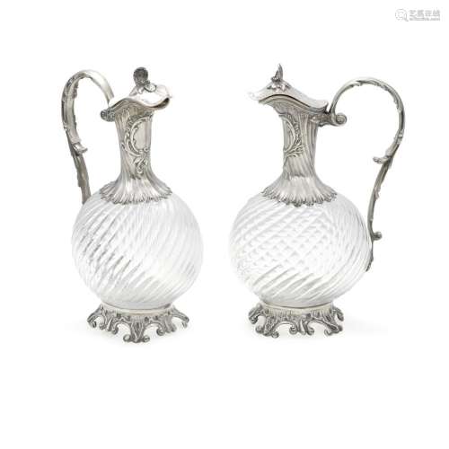 A PAIR OF FRENCH STERLING SILVER MOUNTED CUT GLASS FOOTED EW...
