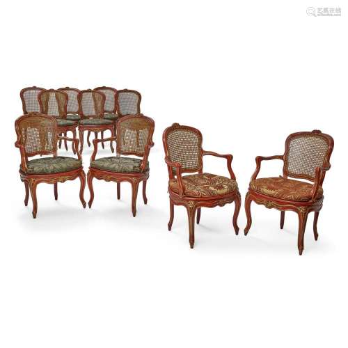 A SET OF TEN LOUIS XV STYLE RED PAINTED AND CANED WOOD FAUTE...