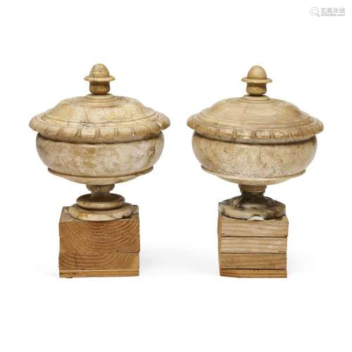 A PAIR OF MARBLE URNS WITH COVERS18th century