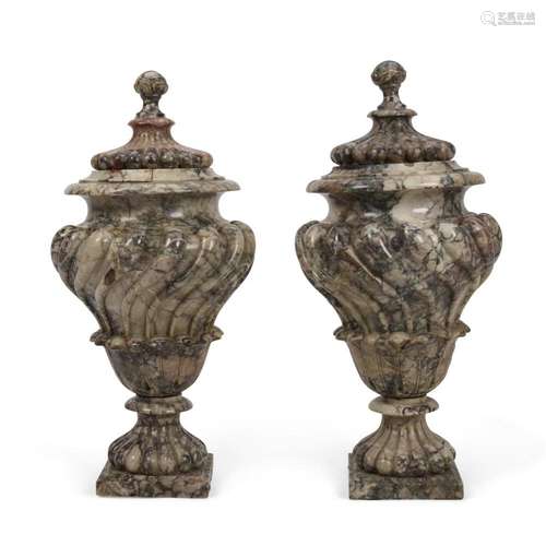 A PAIR OF MARBLE URNS WITH COVERS18th century