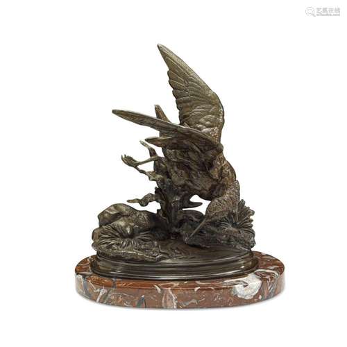 A PATINATED BRONZE MODEL OF A SANDPIPER REGARDING A WORM Aft...