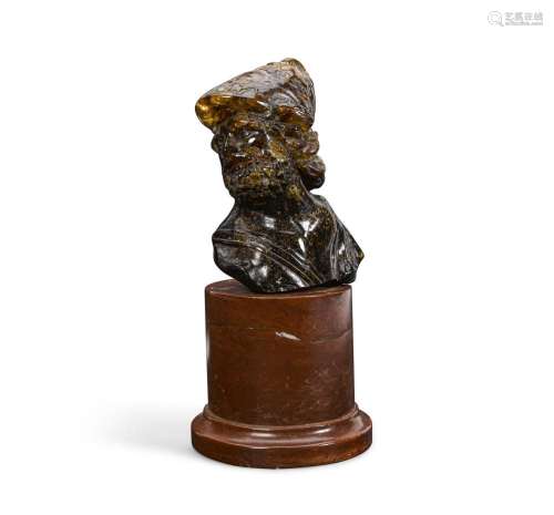 AN ITALIAN CARVED BLUE AMBER BUST OF AJAXPossibly 17th centu...