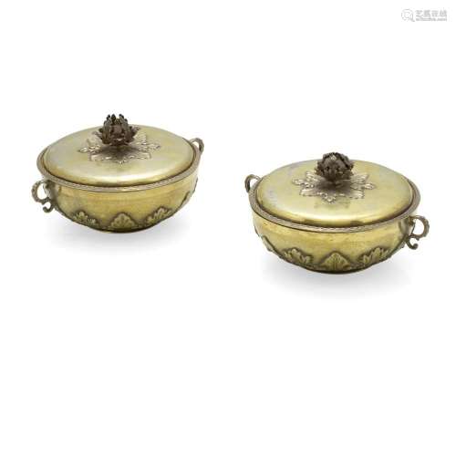 A PAIR OF ENGLISH SILVER-GILT TWO-HANDLED COVERED PORRINGERS...