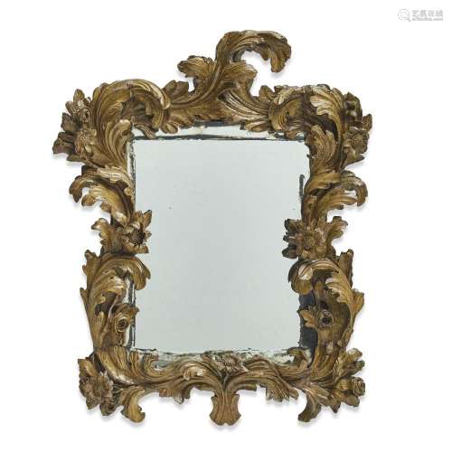 AN ITALIAN BAROQUE CARVED PINE MIRROREarly 18th century