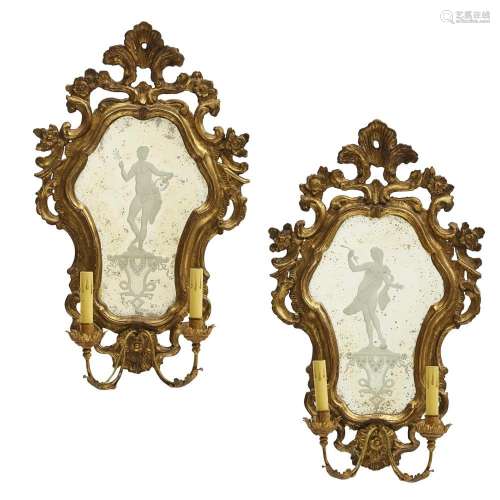 A PAIR OF VENETIAN STYLE GILTWOOD AND ETCHED GLASS TWO-LIGHT...