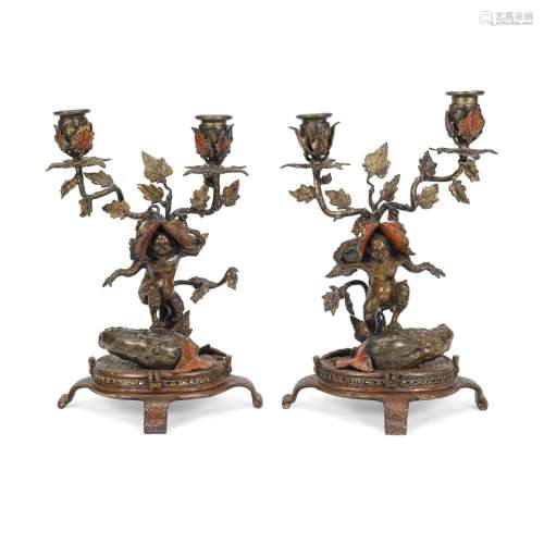 A PAIR OF COLD PAINTED AND PATINATED BRONZE FIGURAL TWO-LIGH...