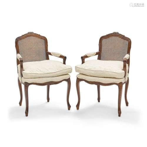 A PAIR OF LOUIS XV STYLE CANED AND STAINED WOOD FAUTEUILS20t...